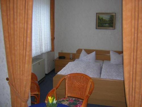 Hotel Zur Winzergenossenschaft Ernst Pokoj fotografie